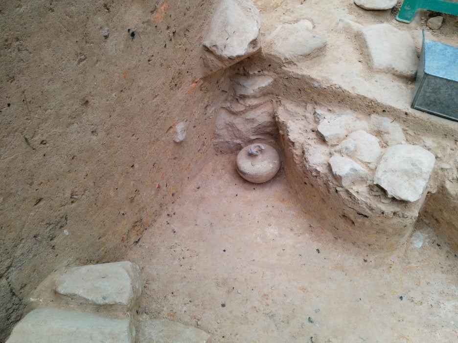 A stoneware vessel that was excavated at an Angkor Wat dig site.