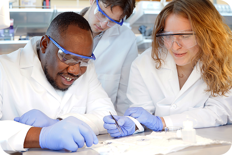 Three scientists in a lab.